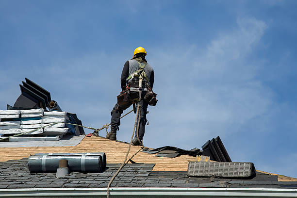 Professional Roofing technician working in Harper, WV
